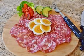 chopped sausage with eggs and vegetables
