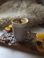cup of tea with spices on the table