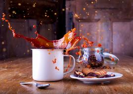 Splash of drink in mug on table