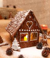 Christmas pastry, Gingerbread House with candle inside