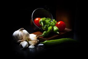 vegetables in the dark as a still life