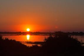 red Sunset Over River