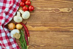 checkered tablecloth and vegetables on the table