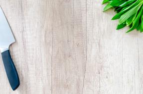 knife and herb on Wooden Table, background