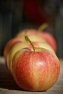 Close-up of the colorful and beautiful, shiny apples in light