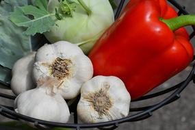 red pepper, black and cabbage in a bowl