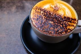 cup of cappuccino on a table in a cafe