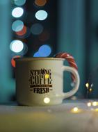 cup with coffee drink on blurred background