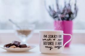 chocolate on a plate and a cup of tea