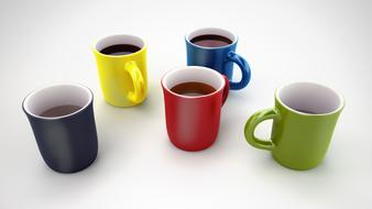 colorful mugs with hot drinks