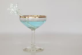 Snowflake in wide glass with blue drink