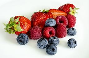 multicolored ripe apples on a white background