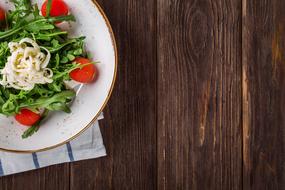 green salad with cheese and tomatoes