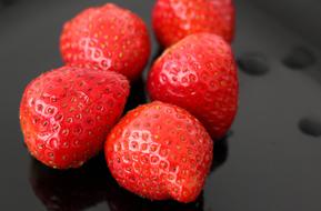 strawberry on the black background