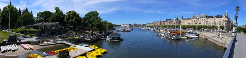 colorful boats on water at old city, sweden, stockholm