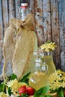 lemon syrup in clear bottles