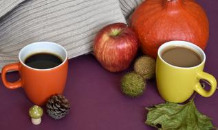 coffee in large mugs with fruit as a still life