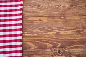 checkered tablecloth on a wooden table