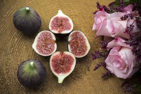 figs in a cut on a wooden surface