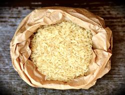 white rice in a paper bag