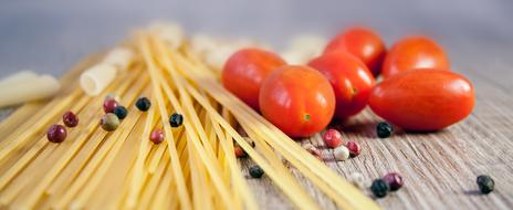 closeup picture of Pasta Noodles and tomato