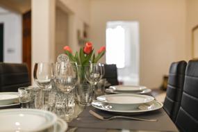 served table with vase of tulips