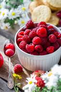 ripe strawberries in a white cup for a breakfast