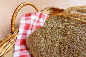 Bread Brown in a wicker basket close up