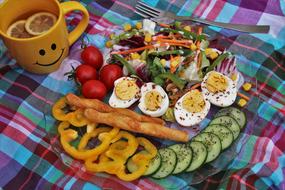 chopped vegetables, boiled eggs and vegetarian salad on a plate