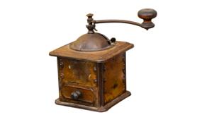 Beautiful retro coffee grinder at white background