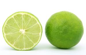 whole green lime and half