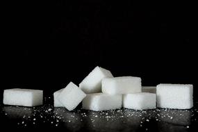 Sugar pieces at Black Background