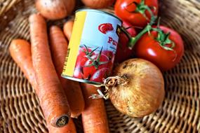 vegetables and tomato paste in a basket