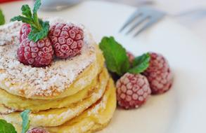 pancakes with raspberries and mint for breakfast