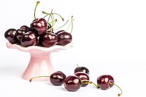 ripe cherries on a dessert stand