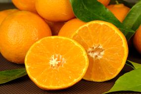 Beautiful tangerines with green leaves