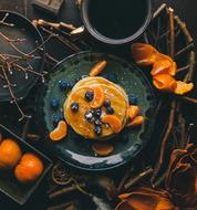 gourmet dish with tangerines