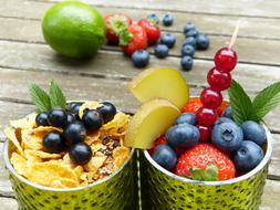 fruit desserts in green glasses