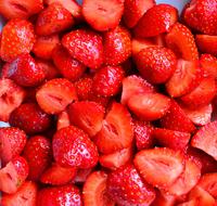 macro photo of chopped red strawberries