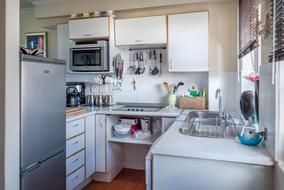 small white kitchen in the house