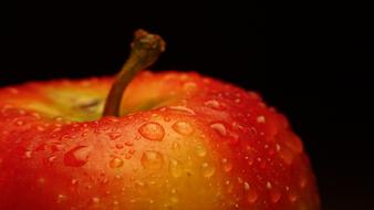 top of wet red Apple, macro