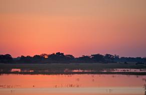 Sunset Over River red