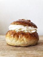 homemade bun with cream on the table