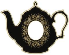 victorian teapot with empty oval frame