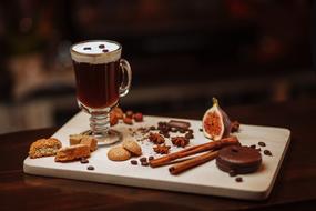 irish Coffee with cinnamon and cookies