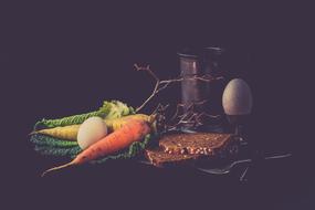 Still life with colorful vegetables at dark background