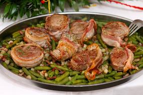 fried bacon on vegetables