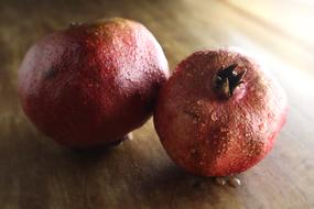 two Pomegranate Fruits side by side