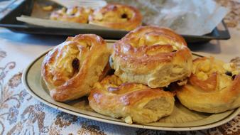 pies with apple filling on a plate