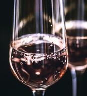 Alcoholic rose champagne in a glass